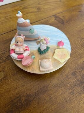 Precious Moments Pastel Beach Figurine with Pink and Blue Accents